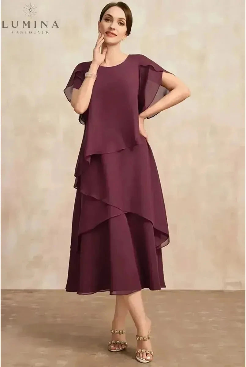Pink Celestia classic chiffon dress by Lumina Wear, flowing fabric with elegant design, displayed on a model.