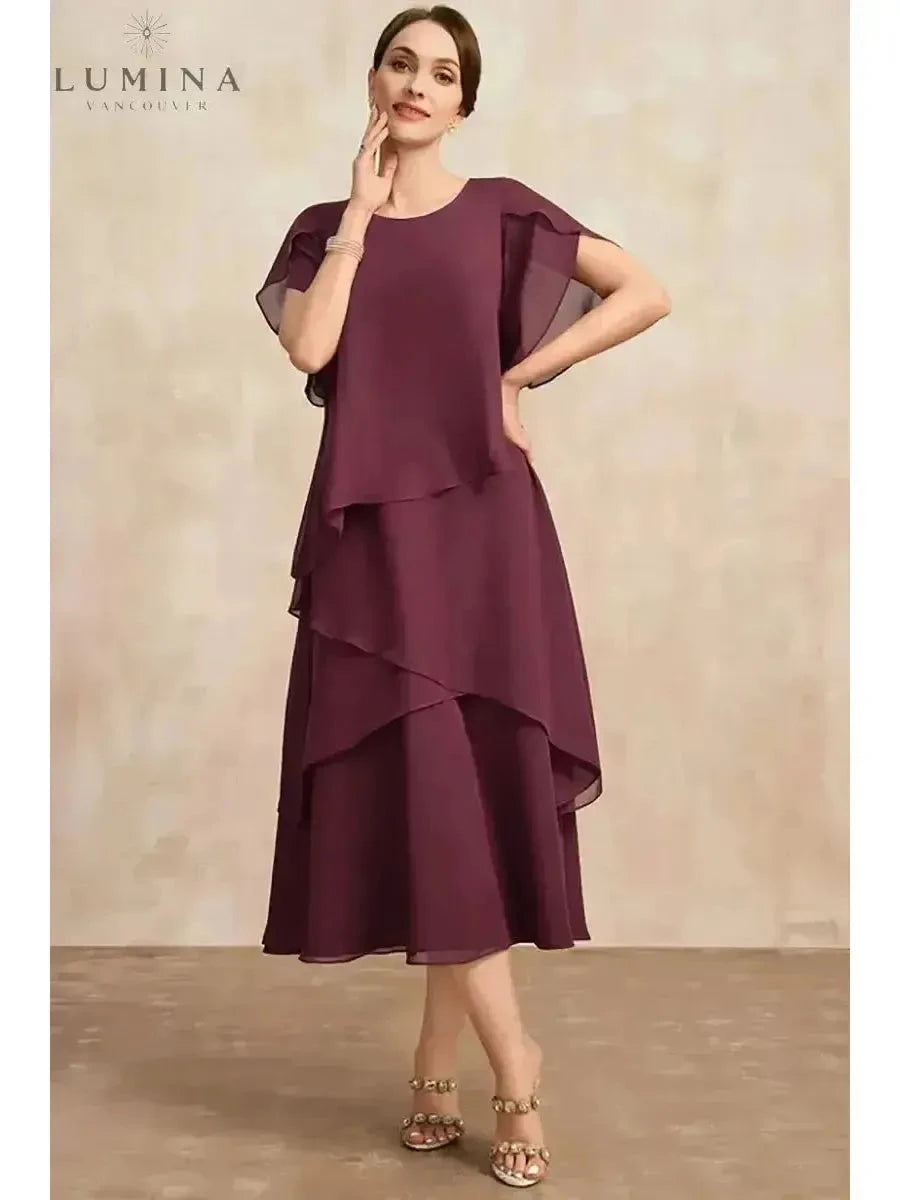 Pink Celestia classic chiffon dress by Lumina Wear, flowing fabric with elegant design, displayed on a model.