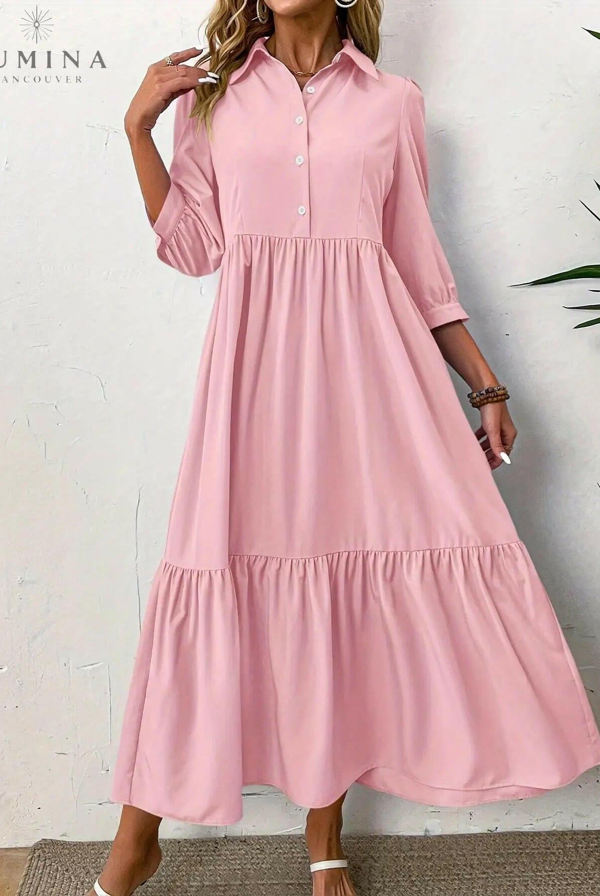 Pink Embla Button Dress by Lumina Wear, featuring a fitted silhouette and button details, displayed on a model.