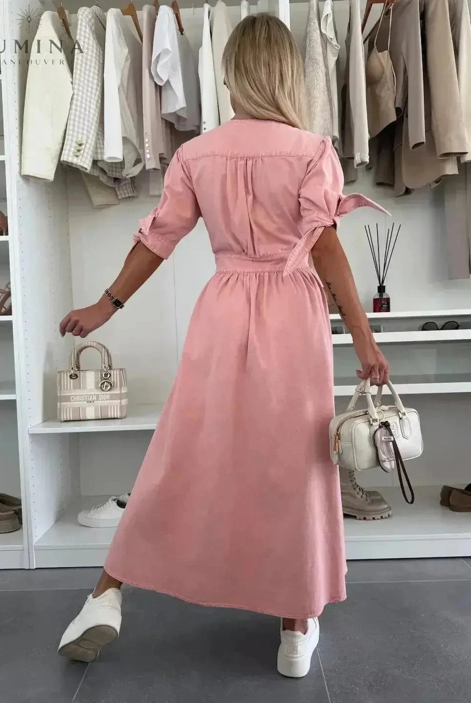 Lumina Wear Julie denim dress, pink casual dress with a fitted bodice and flared skirt, displayed on a mannequin.