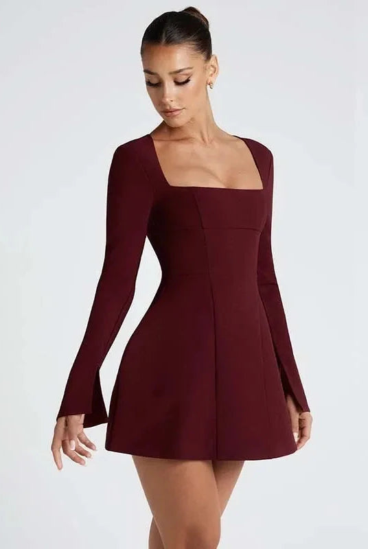 Red Lumina Wear Aria women's mini dress featuring a fit and flare silhouette, displayed on a hanger.