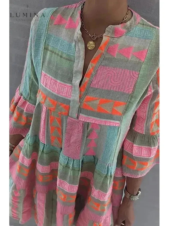 Lissie spring dress by Lumina Vancouver, featuring a lightweight floral print and flowing fabric, perfect for warm weather.