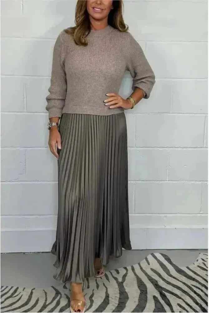 Sky blue Mariana long-sleeved dress by Lumina Wear, featuring a fitted silhouette and elegant design, displayed on a hanger.