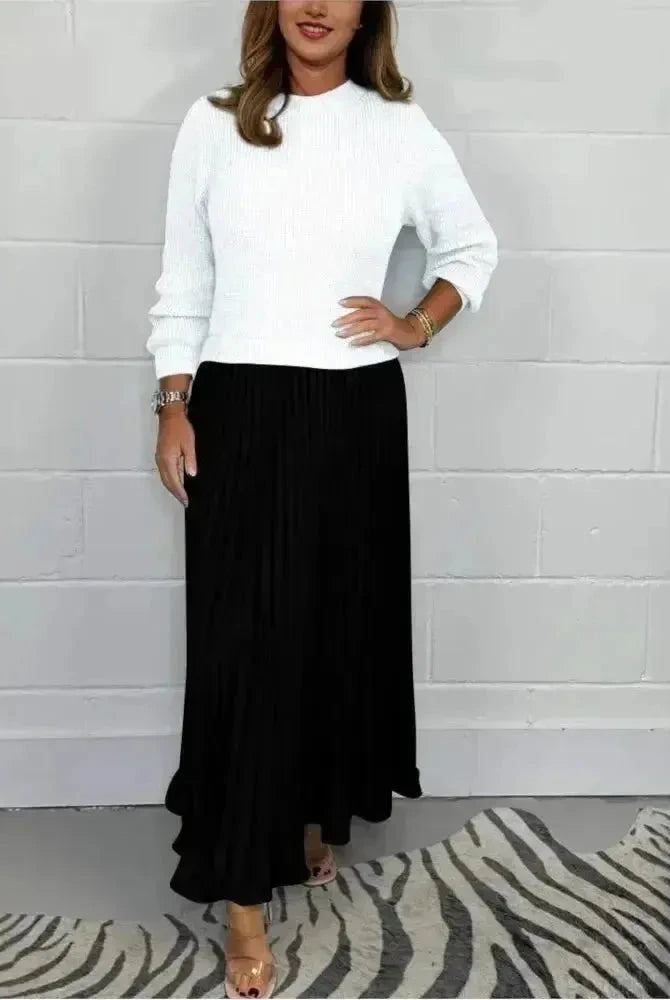 Sky blue Mariana long-sleeved dress by Lumina Wear, featuring a fitted silhouette and elegant design, shown on a model.