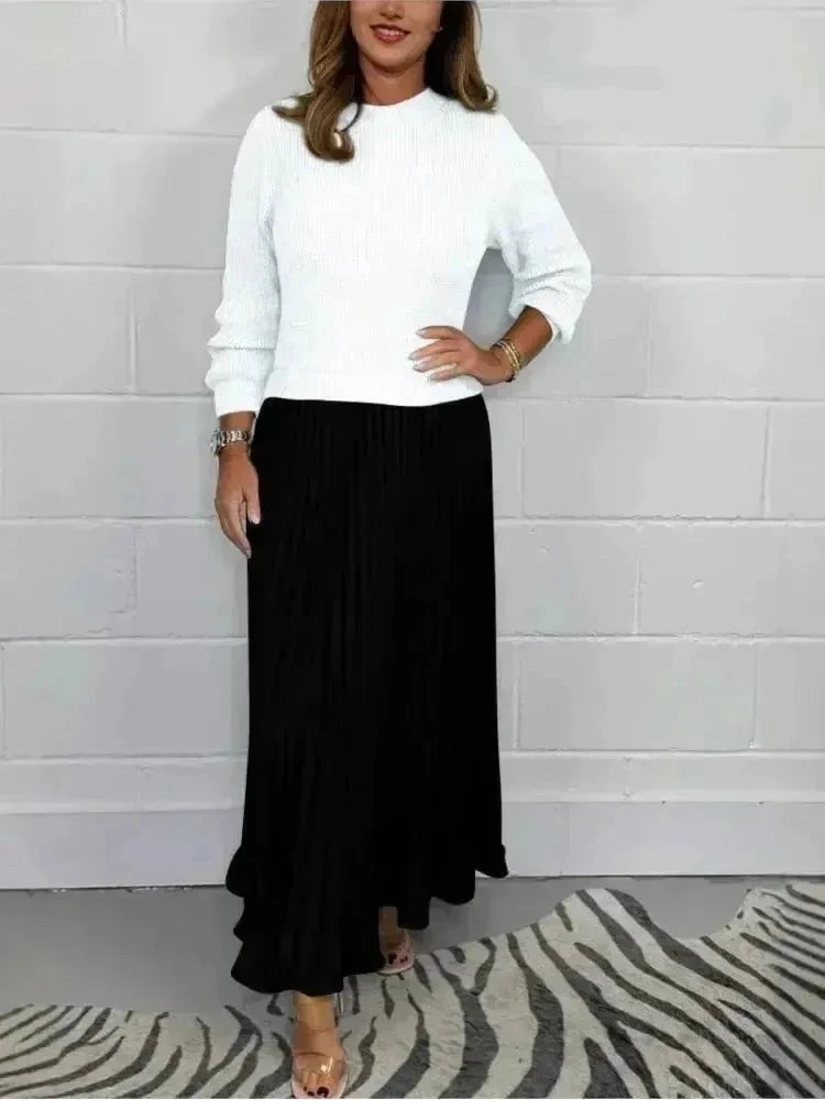 Sky blue Mariana long-sleeved dress by Lumina Wear, featuring a fitted silhouette and elegant design, shown on a model.