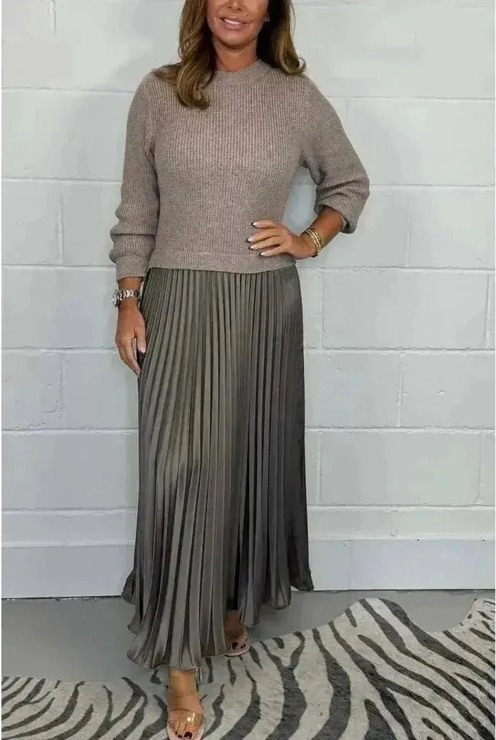 Sky blue Mariana long-sleeved dress by Lumina Wear, featuring a fitted silhouette and elegant design, shown on a model.