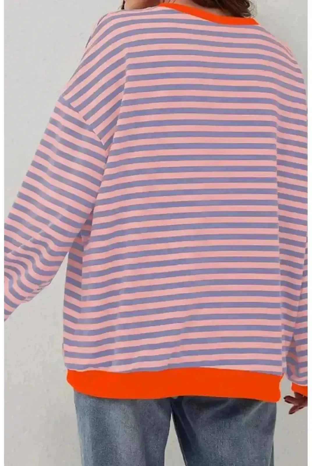 Sky blue oversized fall sweater by Lumina Wear, featuring a cozy, relaxed fit and soft knit fabric.