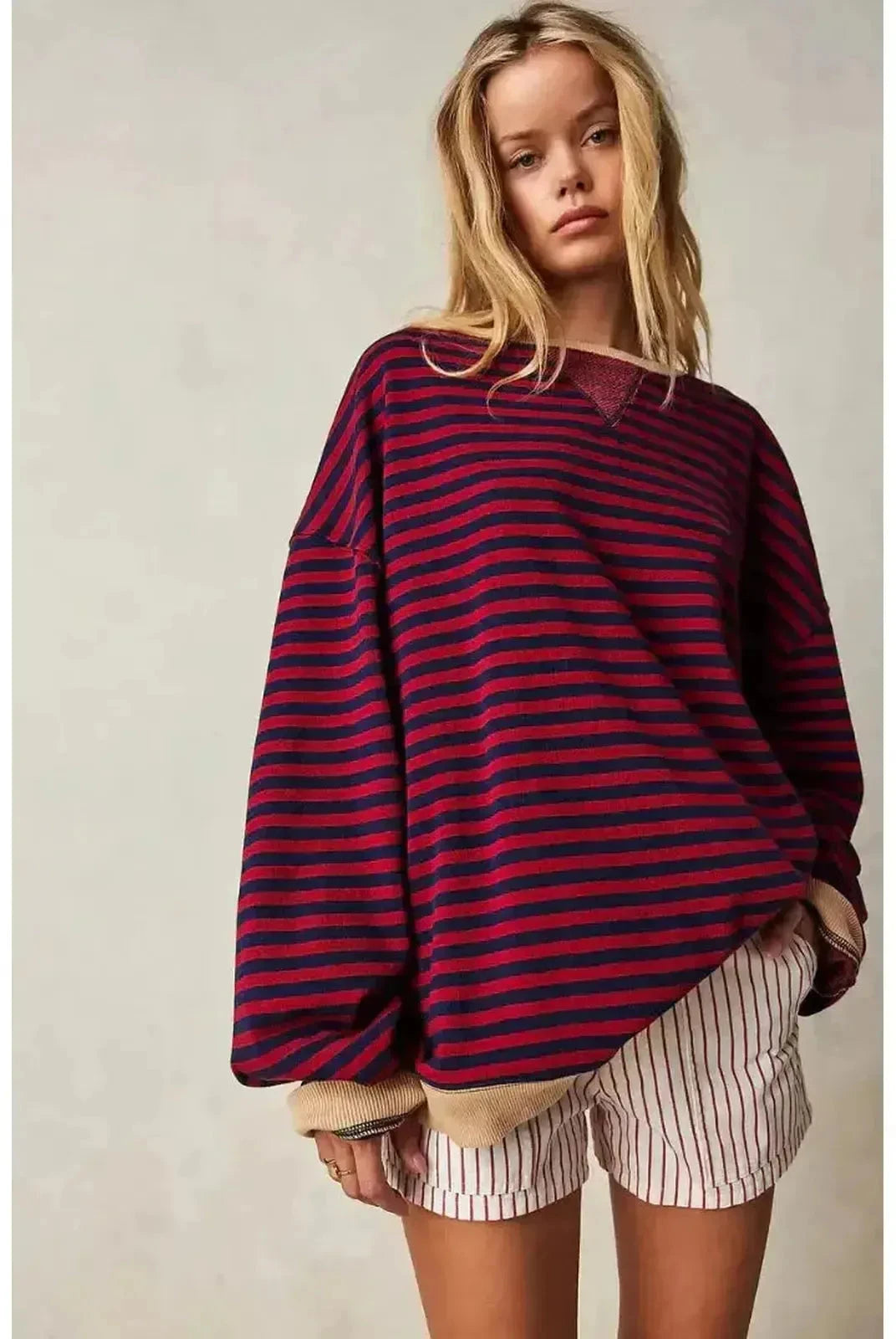 Sky blue oversized fall sweater by Lumina Wear, featuring a cozy, relaxed fit and soft knit fabric, perfect for autumn wear.