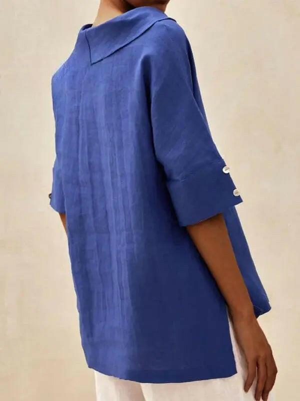 Blue women's casual V-neck shirt by Lumina Vancouver, featuring a relaxed fit and comfortable fabric.