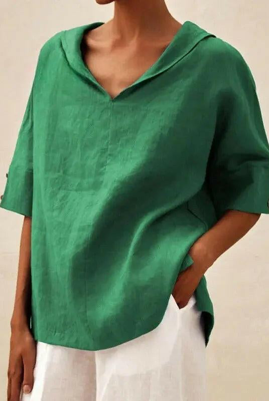 Blue women's V-neck casual blouse by Lumina Wear, featuring a relaxed fit and soft fabric, perfect for everyday wear.