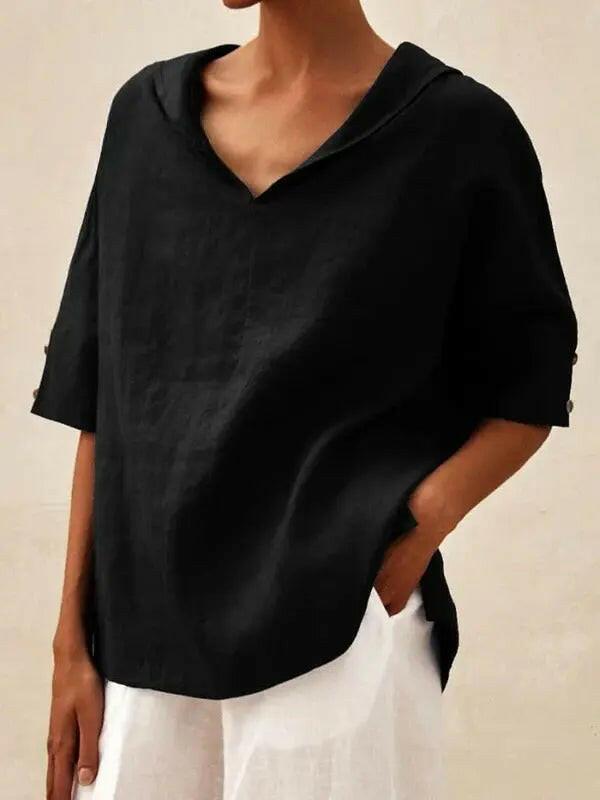 Blue women's casual V-neck shirt by Lumina Vancouver, displayed flat with soft fabric texture.