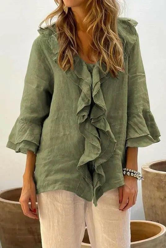 Blue women's ruffled blouse by Lumina Wear featuring casual cotton fabric and 3/4 sleeves, styled for a relaxed look.