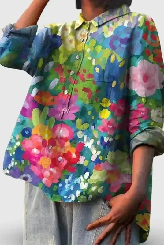 Women's vintage floral art print cotton blouse by Lumina Wear, featuring a colorful, casual floral design and relaxed fit.
