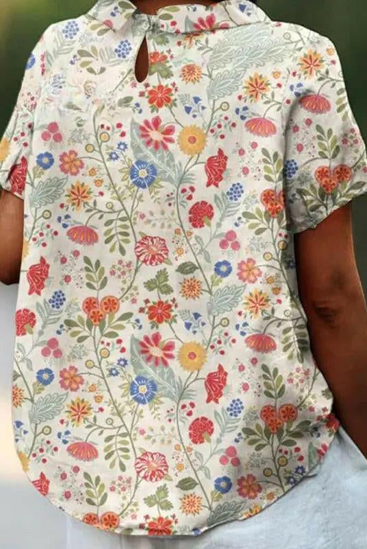 Women's casual cotton blouse with pastoral floral art print from Lumina Wear, featuring a relaxed fit and stylish design.
