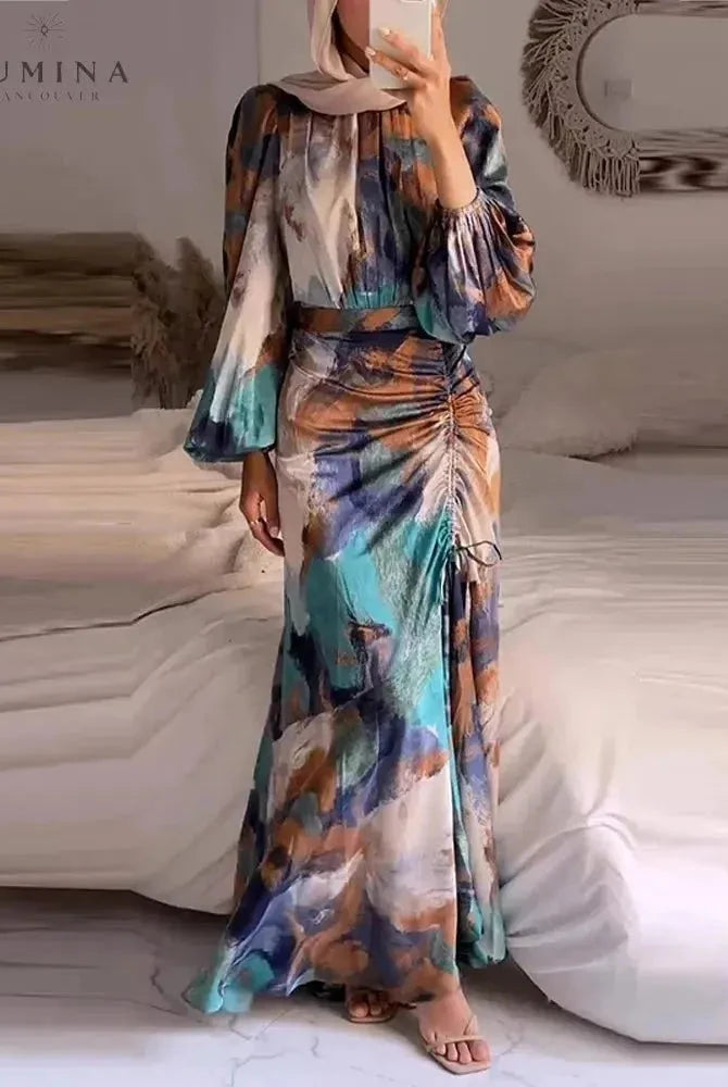 Elegant Samarah pleated evening dress by Lumina Wear, featuring flowing fabric and sophisticated design, perfect for special occasions.