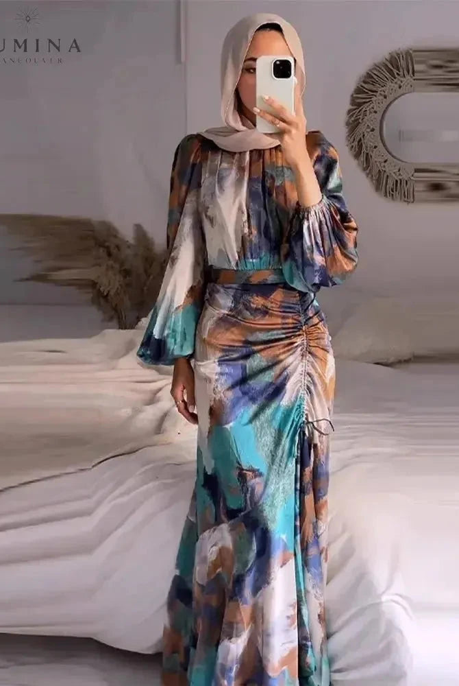 Lumina Wear Samarah elegant pleated evening dress, showcasing a sophisticated design with flowing fabric and stylish pleats.