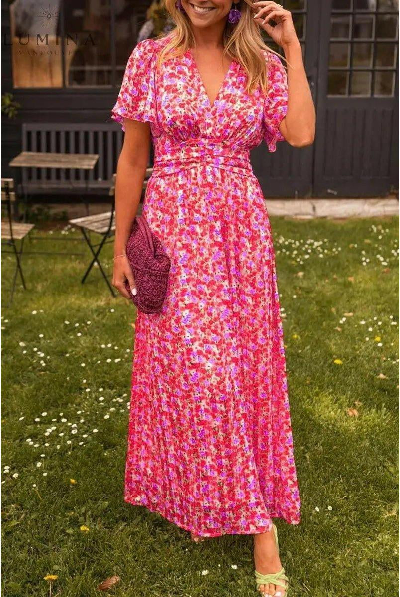 Orange Isabella maxi dress by Lumina Vancouver, elegant wedding guest dress with flowy fabric and sophisticated style.