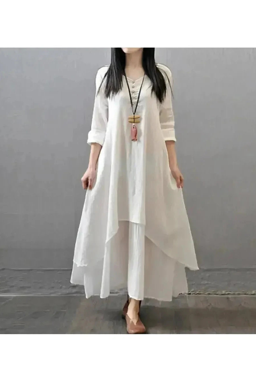 Lumina Wear Alessia linen dress in vibrant yellow, featuring a relaxed fit and casual elegance for summer wear.