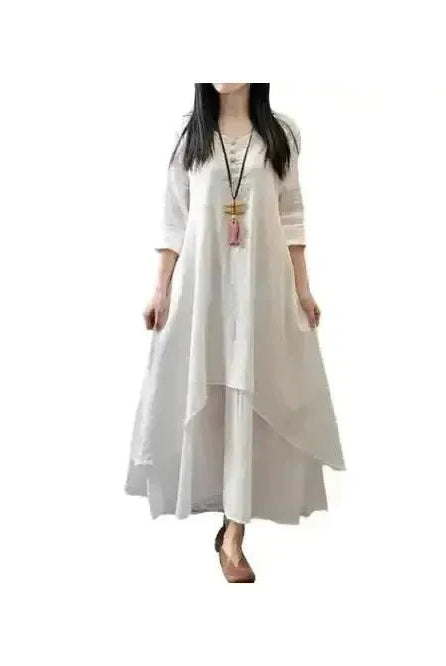 Yellow Alessia linen dress by Lumina Wear, lightweight and breezy with a relaxed fit, displayed on a model.