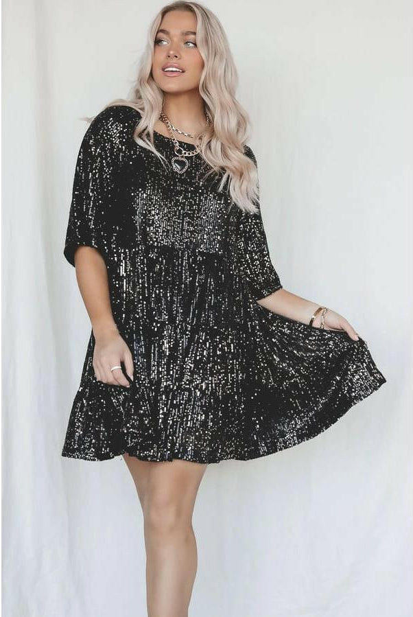 Lumina Vancouver Luminette™ sparkling mini dress in white and silver, showcasing a stylish, shimmering party dress.