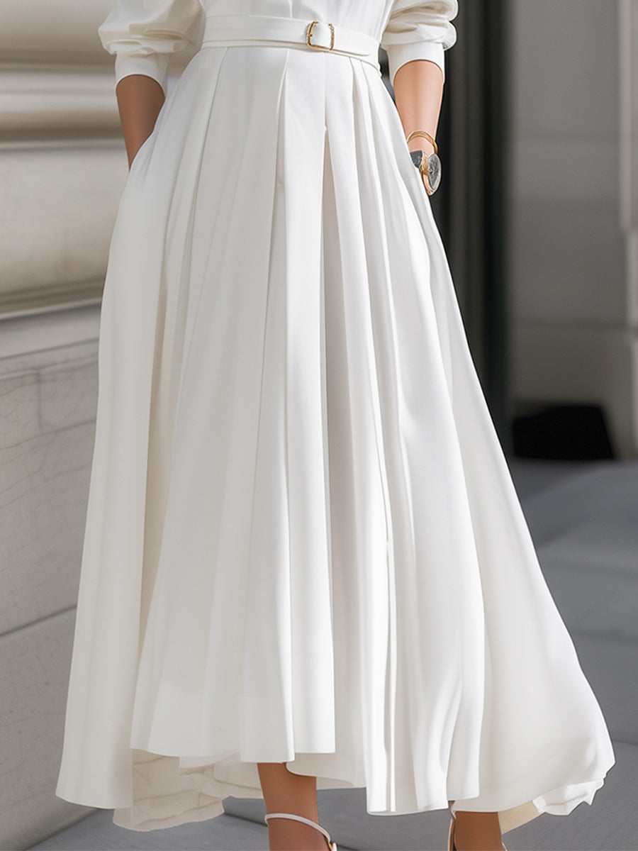 White belted shirt dress with pleated maxi skirt from Lumina Wear, featuring a stylish, flowing design perfect for casual or formal wear.