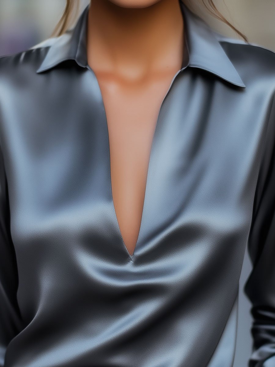 Silver satin Luna V-neck blouse by Lumina Vancouver, featuring a stylish V-neck design and lightweight fabric.