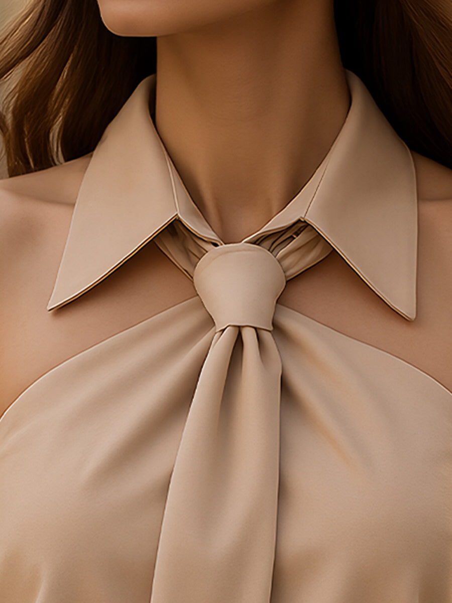 Khaki sleeveless halter blouse with neck tie by Lumina Vancouver, featuring a stylish and feminine design.