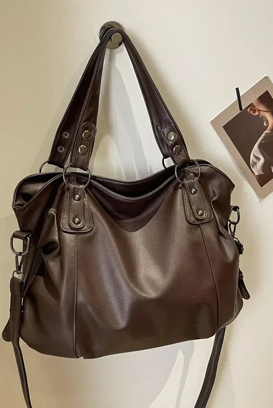Lumina Wear Lunelle spacious black handbag with versatile strap, stylish and large for everyday use.