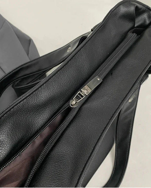 Lumina Wear Lunelle black handbag with spacious interior and versatile strap, ideal for stylish everyday use.