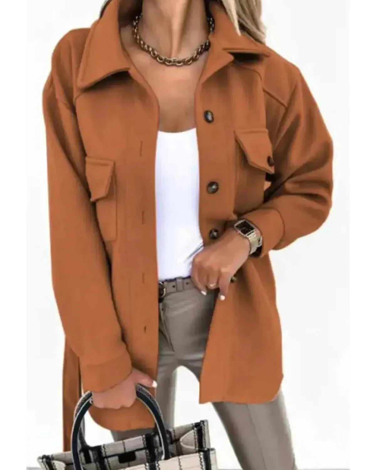 Light-colored Lumina Wear Lynara stylish autumn jacket displayed on a hanger, showcasing its lightweight, versatile design.