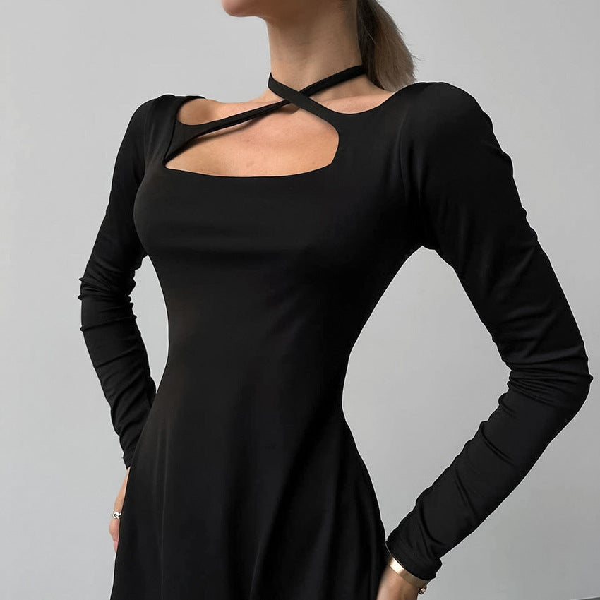 Black Lyra A-line mini dress with square neckline by Lumina Vancouver, shown on a model.
