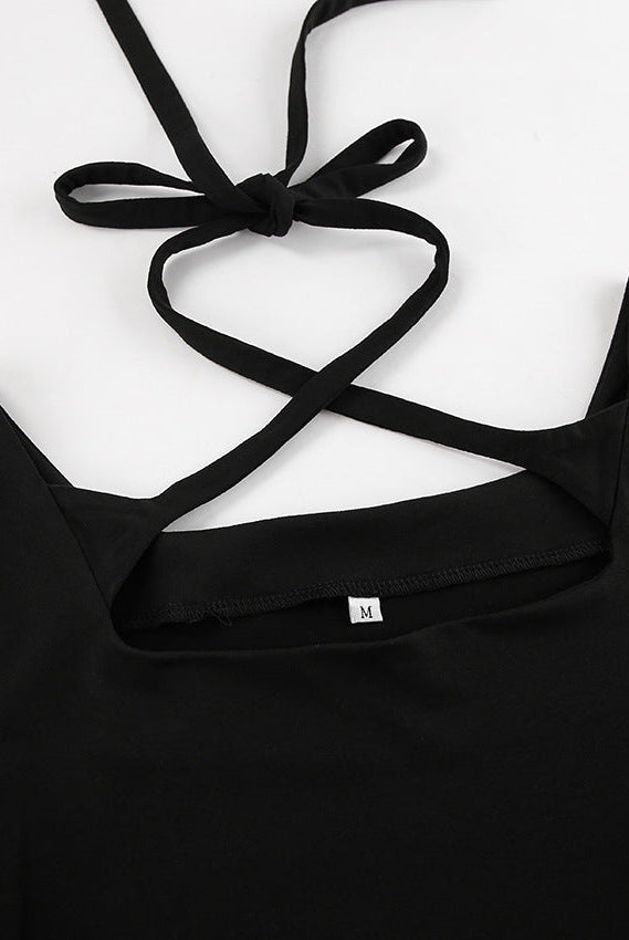 Black Lyra A-line dress with square neckline by Lumina Vancouver, shown as a stylish mini dress on a model.