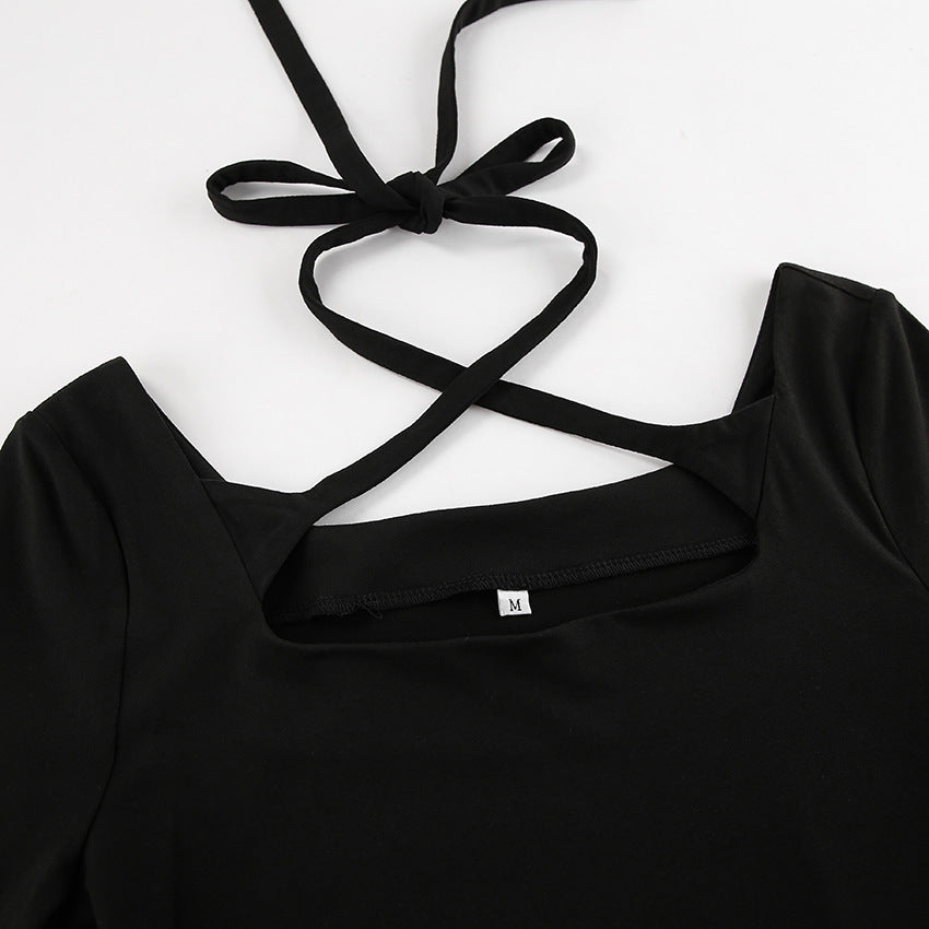 Black Lyra A-line dress with square neckline by Lumina Vancouver, shown as a stylish mini dress on a model.