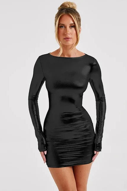 Black faux leather Therese mini dress by Lumina Wear featuring a fitted bodycon silhouette and sleeveless design.