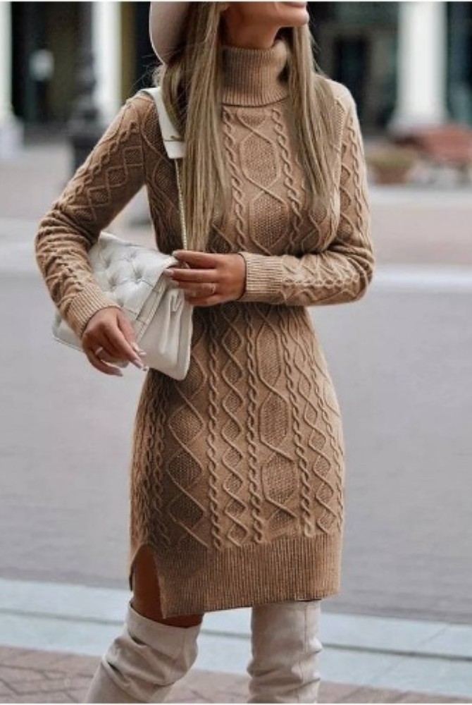 Black Lyra mini dress by Lumina Vancouver featuring a turtleneck and cable knit design, shown on a model.