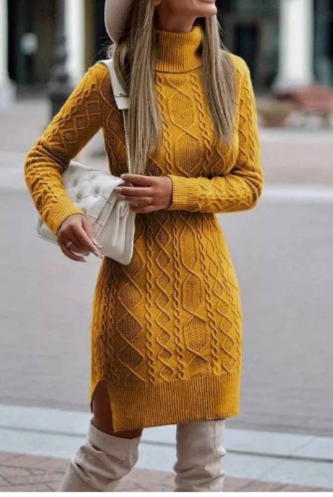 Black Lyra mini dress by Lumina Vancouver featuring a turtleneck and cable knit design, perfect for stylish winter wear.