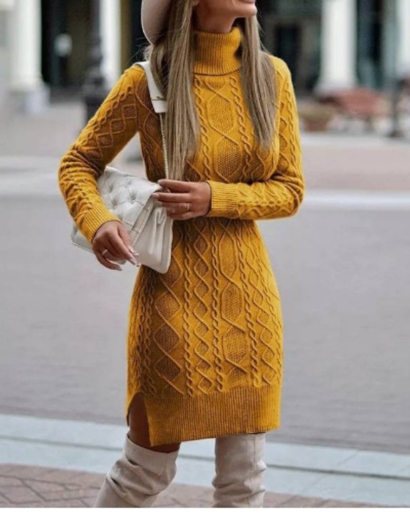 Black Lyra mini dress by Lumina Vancouver featuring a turtleneck and cable knit design, perfect for stylish winter wear.
