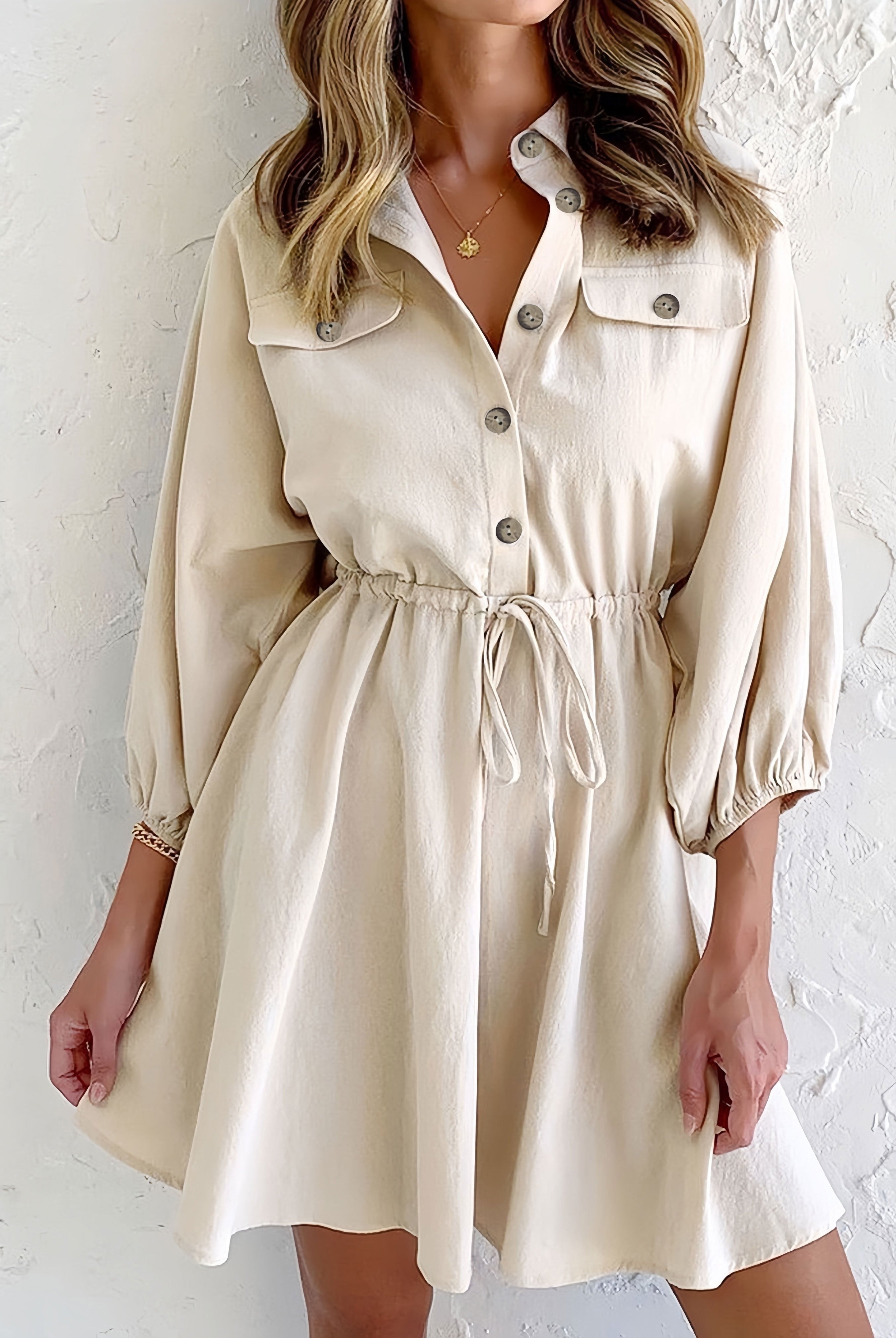 Beige and white Lyra button-down collared shirtdress by Lumina Vancouver, shown in a 2XL size on a model.