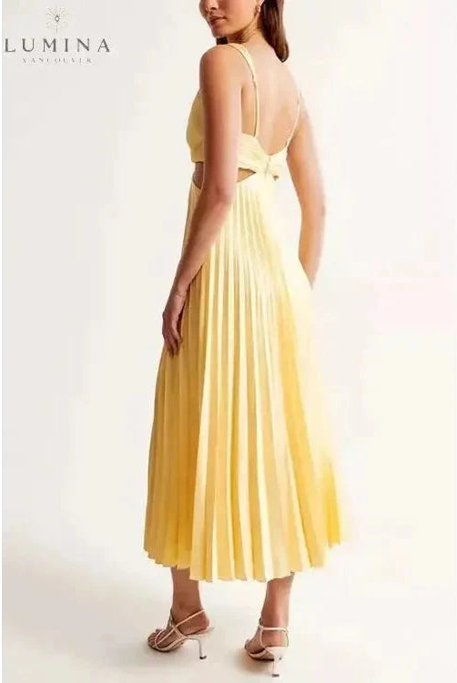 Lumina Wear Madeleine elegant yellow maxi dress, flowing evening gown with a fitted bodice and full skirt, perfect for wedding guests.