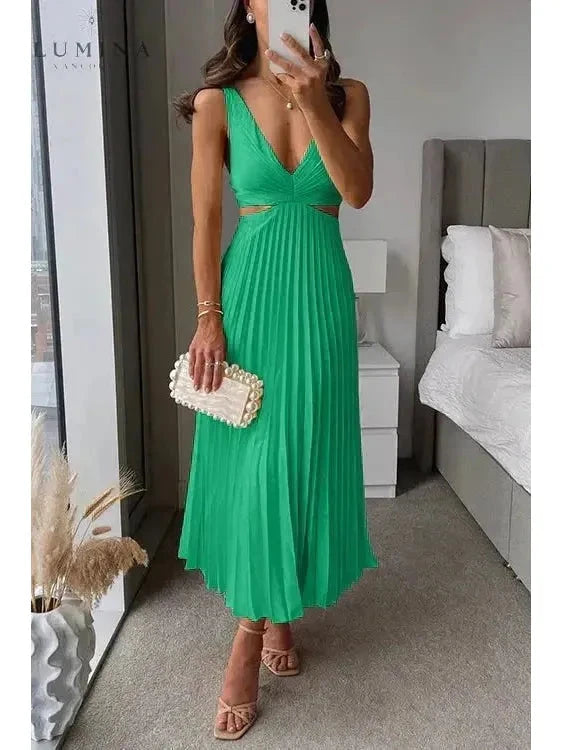 Yellow Madeleine elegant maxi dress for wedding guests by Lumina Vancouver, featuring flowing fabric and sophisticated style.