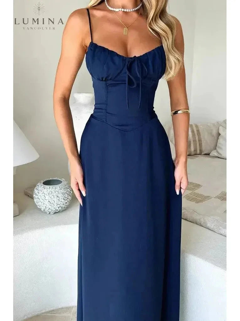Yellow Maelys lace-up sleeveless maxi dress by Lumina Vancouver, perfect for wedding guests, shown in a stylish full-length view.