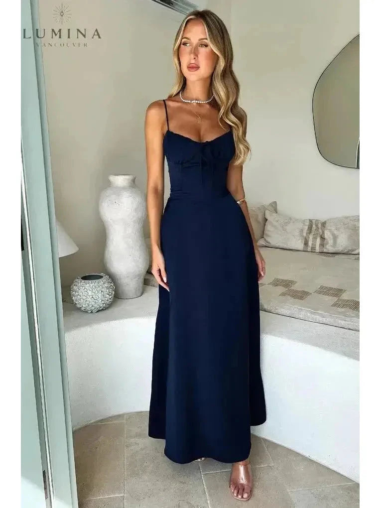 Yellow Maelys lace-up sleeveless maxi dress by Lumina Vancouver, perfect for wedding guests, shown on a model.