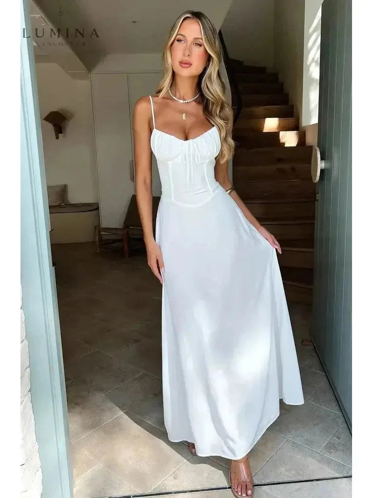 Yellow Maelys lace-up sleeveless maxi dress by Lumina Vancouver, perfect for wedding guests, featuring a flowy silhouette and elegant design.