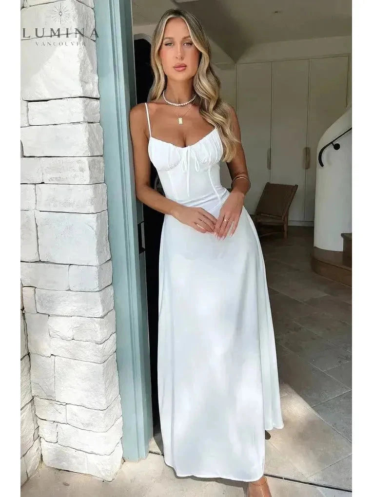 Yellow Maelys lace-up sleeveless maxi dress by Lumina Vancouver, perfect for wedding guests, shown in size 8-10 S.