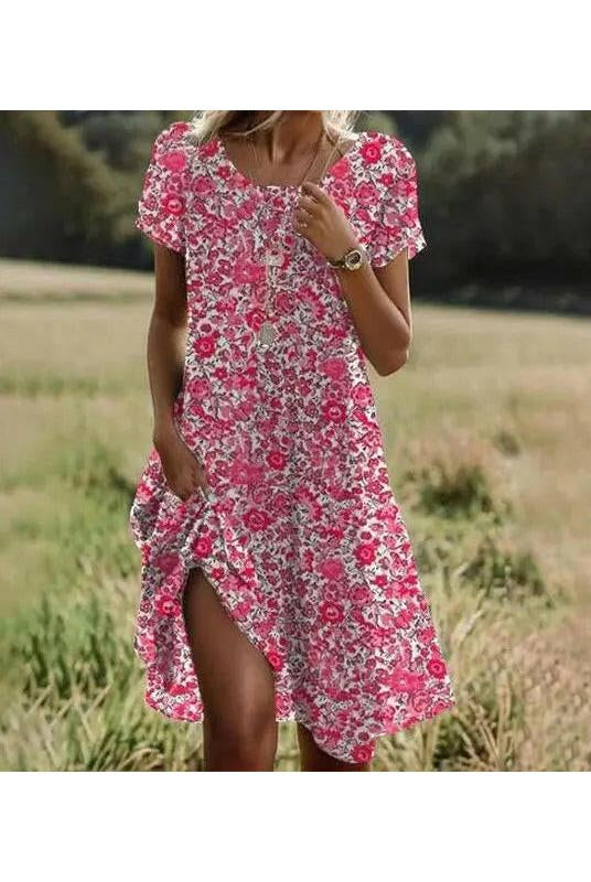 Red Maeve bohemian dress by Lumina Vancouver, featuring flowing fabric and relaxed style suitable for casual or festival wear.