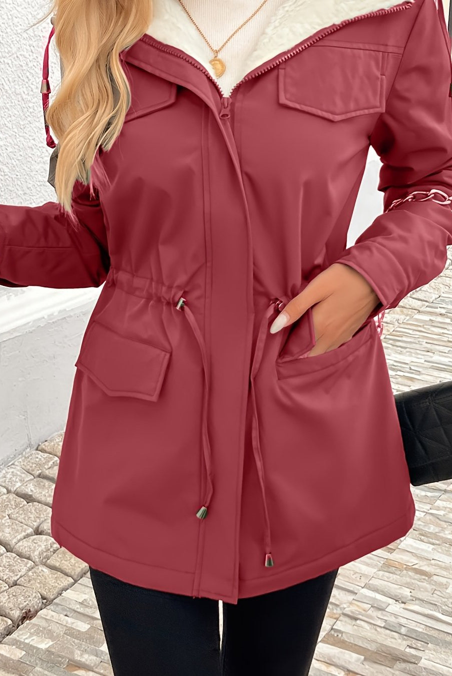 Maisie cozy sherpa-lined parka jacket by Lumina Wear, black with adjustable fit and warm interior, suitable for cold weather.