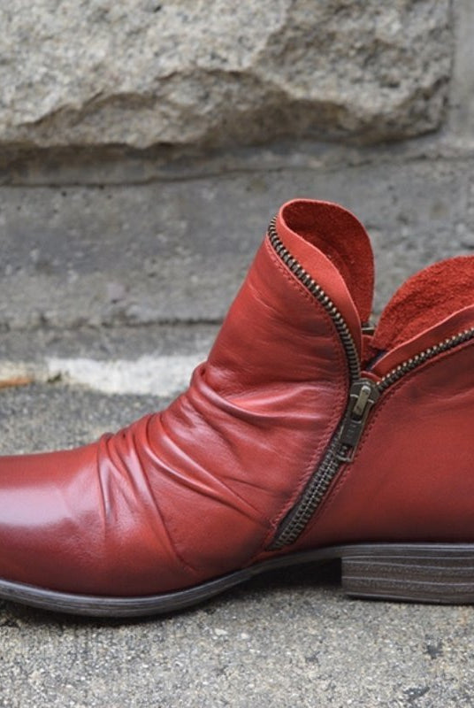 Makayla Lumina black leather ankle boots with sleek design and pointed toe, stylish footwear for women.