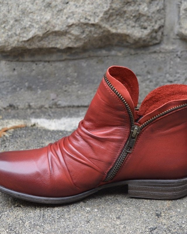 Makayla Lumina black leather ankle boots with sleek design and pointed toe, stylish footwear for women.