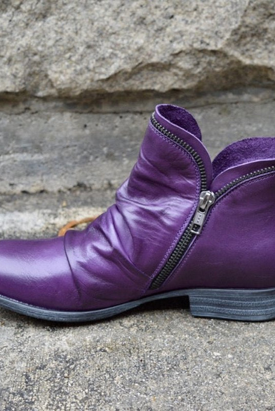 Makayla Lumina black leather ankle boots with sleek design, featuring a pointed toe and low heel for stylish comfort.