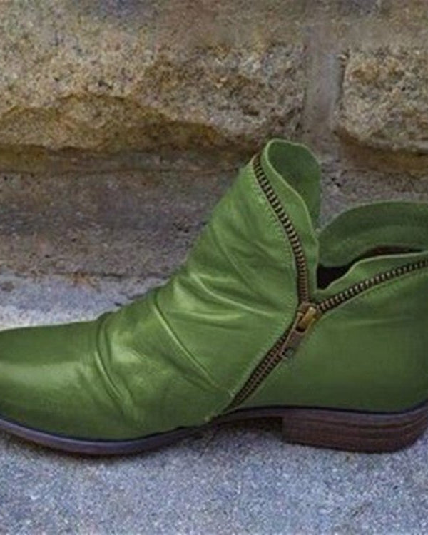 Makayla Lumina black leather ankle boots with sleek design and low heel, stylish footwear for casual or dressy occasions.
